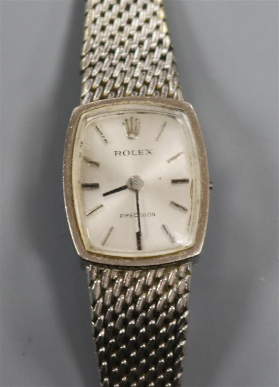 A ladys 9ct white gold Rolex Precision manual wind wrist watch, on a 9ct white gold bracelet (no winding crown).
